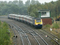Uk Railtours East Midland Trains HST to the East Lancs Railway  on saturday 12 October 2013 passing the soon to go Castleton  East box on the Bags Yard loop line waiting for a path into Castleton station. Photo R. Clarke