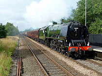 The Duchess of Sutherland, 46233,  passes Smithy Bridge, at 0929 on 3rd August 2012 with the Scarborough Flyer.  (Photo S Carmichael)