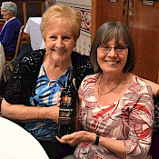 Carol wins the Port