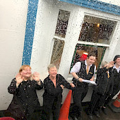 Hotel staff saying by by 